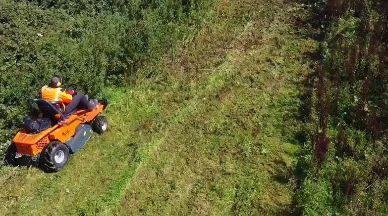 The 4x4 flail mower working a steep hillside