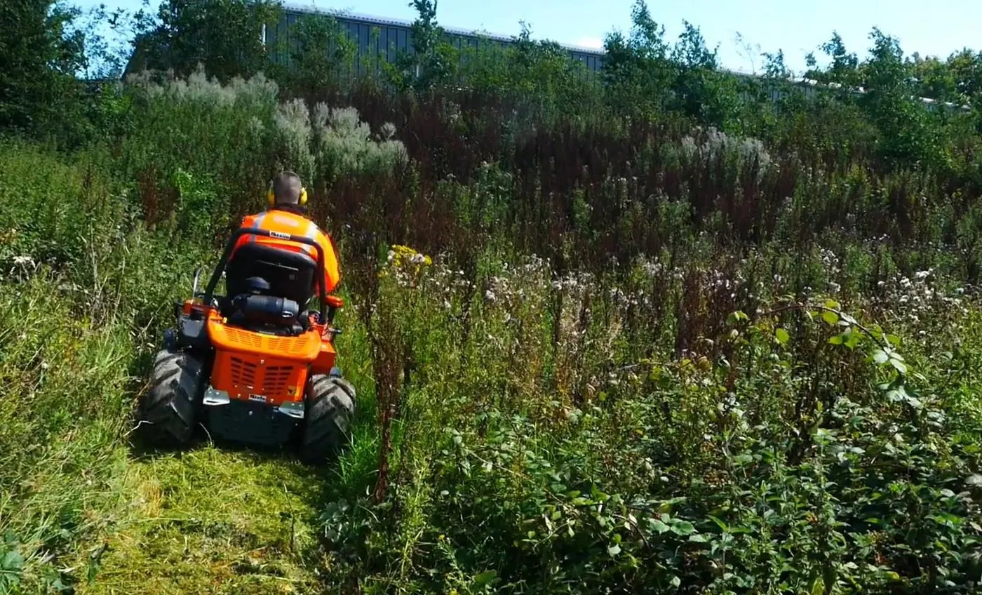 Vegetation management: the 4x4 flail mower clearing overgrown land and scrub